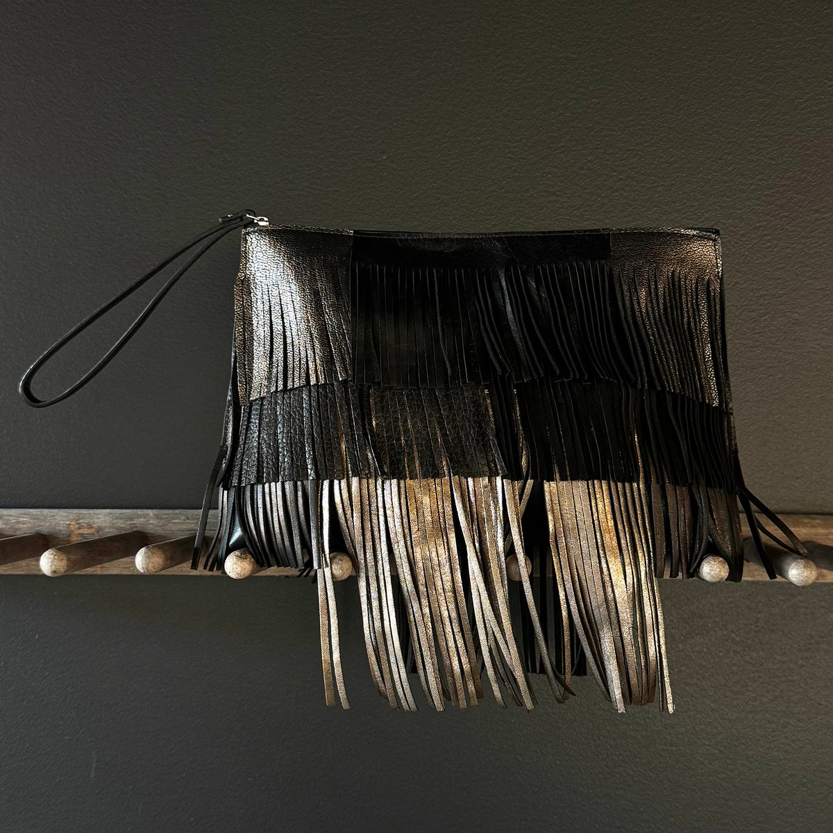 TRAVEL POUCH BLACK AND METALLIC W/ WRISTLET AND FRINGE