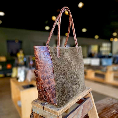 SMALL SLOUCHY POCKET TOTE BROWN FLORENTINE WITH OLIVE CURLY SHEARLING PANEL